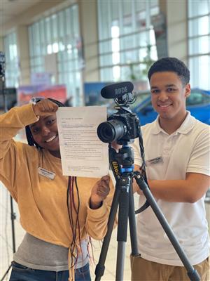Students at an internship at Scott Clark Toyota